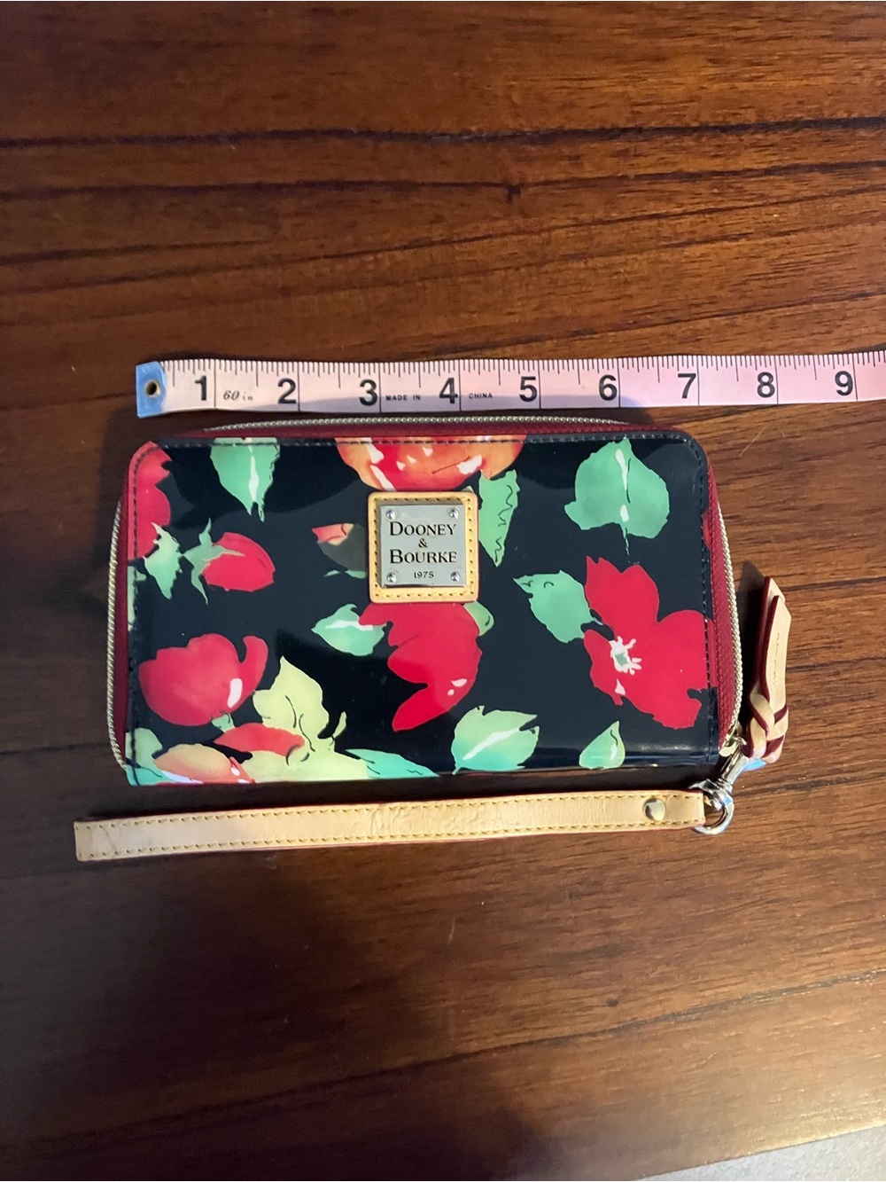 Dooney & Bourke Black Floral Zip Wristlet with Red, Green and Cream Accents